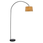 A stylish black and gold floor lamp featuring a decorative shade, adding elegance to any room.